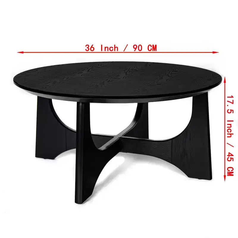 Tavolino rotondo nero con base a piedistallo scultorea